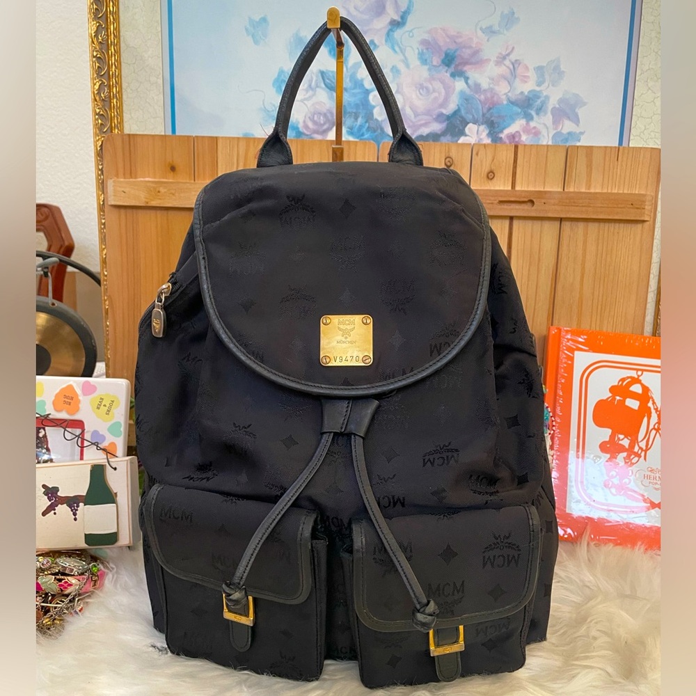 MCM Germany Backpack with Double Snap Pocket Exterior in Nylon. Unisex Use